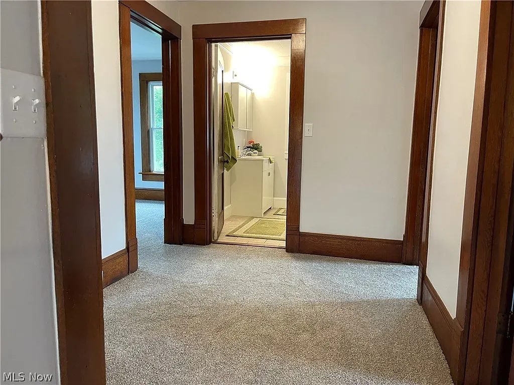 Finished hallway with new carpet
