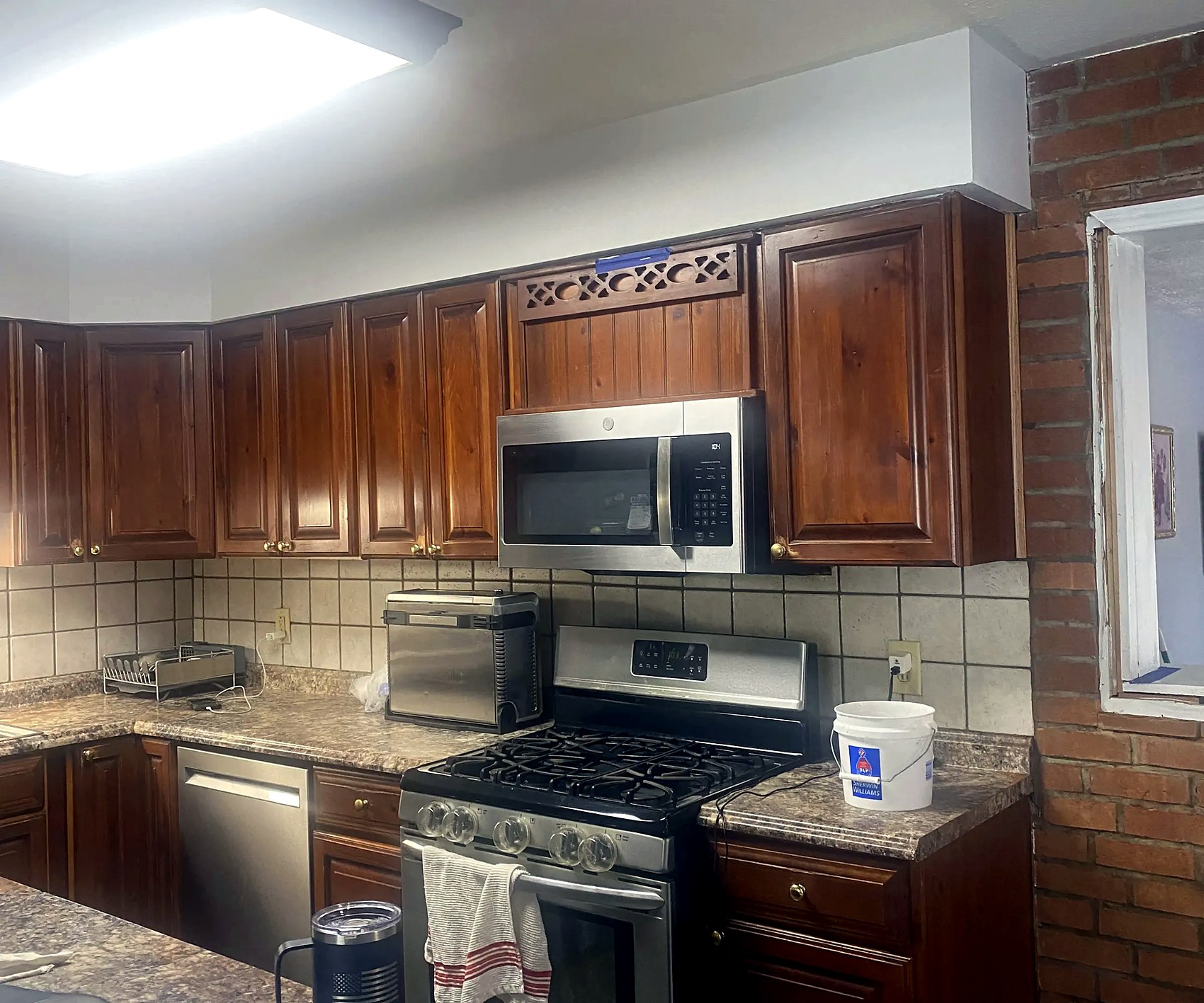 Finished kitchen with wood cabinets