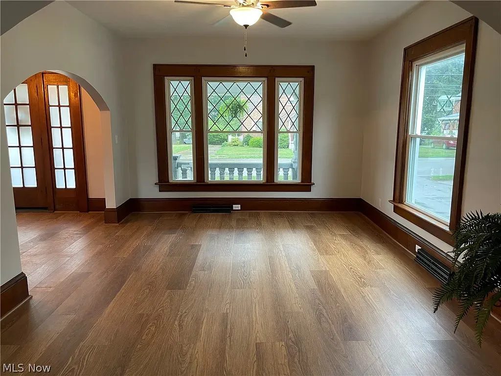 Finished living room with refinished hardwood floors